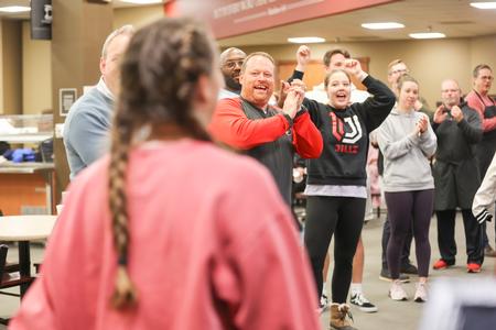 12/6/21 - Staff members cheer for students as they arrive to Food for Finals.  - Kristi McMurry Woody
