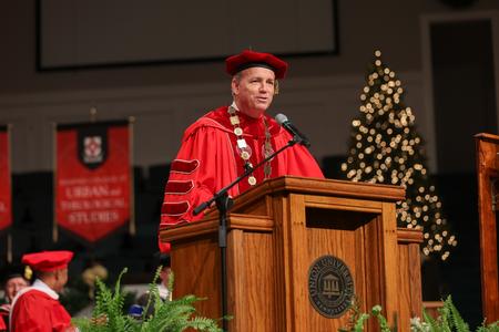 Dub Oliver, president of the university, welcomes guests and graduates to the first Fall Commencement Service. - Photo by Kristi McMurry Woody
