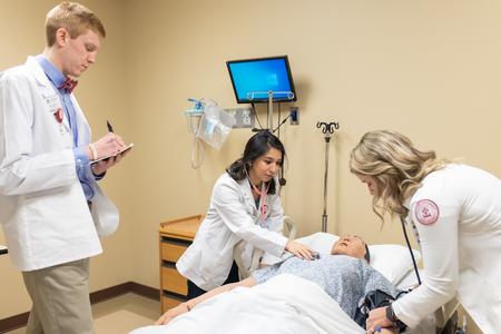 Union pharmacy students work on a simulation in Providence Hall. - Photo by Kristi McMurry Woody