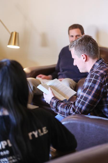 Students in an honors seminar discuss the week's reading. - Photo by Kristi McMurry Woody