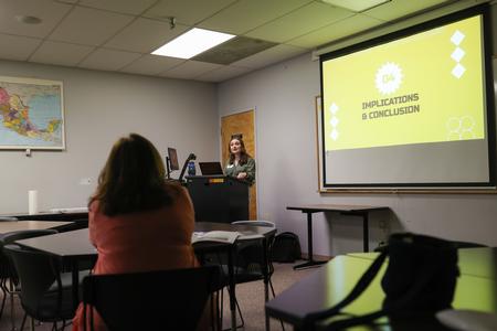 Leah Busler shares her senior presentation for intercultural studies, "Shame & Sexism: An Analysis of Purity Culture, Violence Against Women, and Self-Worth," during the Scholarship Symposium. - Photo by Suzanne Rhodes