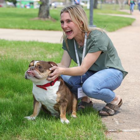 Future student, Madolyn White, poses with Buster at Accepted Student Day 2022. - Photo by Suzanne Rhodes