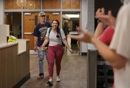 Kirbi Cochran and Garrett Rudolph are celebrated by Union staff members during the annual Food for Finals event. - Photo by Suzanne Rhodes