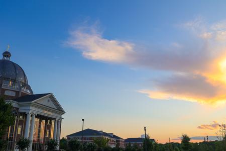 The Logos shines during a beautiful sunset on campus. - Photo by Suzanne Rhodes