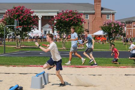 Student Micah McGee speeds through the obstacle course during ResLife's annual 1/2K competition. - Photo by Suzanne Rhodes