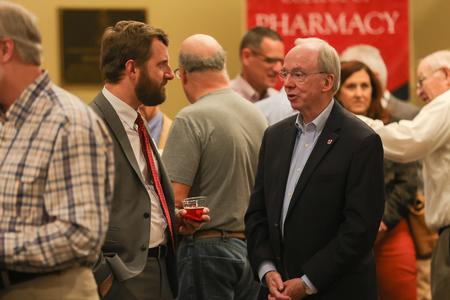 Gregory Poore, associate Professor of philosophy, apologetics, and ethics, catches up with former president, David S. Dockery, at the Faculty and Staff Reception during Union's bicentennial kick-off celebration. - Photo by Suzanne Rhodes