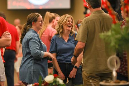 9/24/22 - Rebekah Whitaker, assistant professor of communication arts and director for debate, chats with alumni Lisa Fields Sheilley and Chris Blair, professor of communication arts, at the Faculty and Staff Reception during Union's bicentennial kick-off celebration. - Suzanne Rhodes