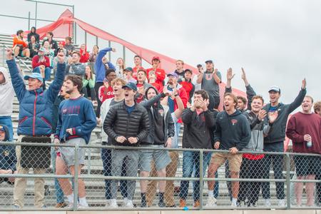 Union students cheer on their peers during the annual Buster Bowl football game against Freed-Hardeman University, as part of homecoming weekend. - Photo by Lauren Steed