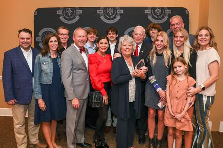 The Jett family receives the Union Family Legacy Award, as part of Union's Meritorious Alumni Awards Banquet. The Union Family Legacy Award is given to one family that has a strong tradition of attending Union University, with a minimum of three generations of graduates, and that has been consistently involved with and committed to the university. - Photo by Suzanne Rhodes