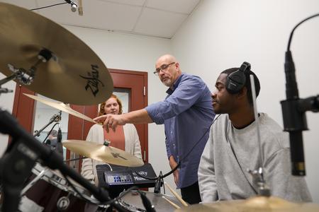 Bob Mayo, assistant professor of recording engineering and music technology, teaches students in Union's new commercial music recording studio. - Photo by Suzanne Rhodes