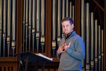 Shawn Chandler ('11), college pastor at Englewood Baptist Church, speaks in chapel. - Photo by Lauren Steed