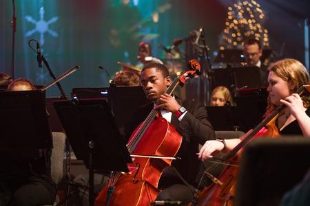 Students Kobi Mosley and Ella Thornton play the cello during Union's annual A Union Christmas concert. - Photo by Kristi McMurry Woody