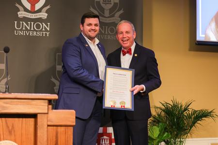 President Dub Oliver accepts an official proclamation from Madison County mayor A.J. Massey to celebrate Feb. 3 as Union University Day in Jackson and Madison County. - Photo by Suzanne Rhodes