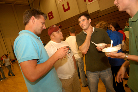Junior Matt Trammell and senior Matt Oshel talk with an incoming freshman about life at Union. - Photo by Morris Abernathy