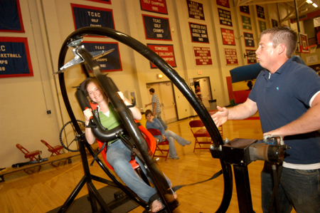 An incoming freshman takes a wild ride during the Spring Thing weekend. - Photo by Morris Abernathy