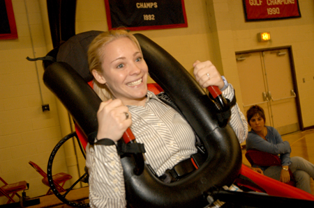 An incoming freshman prepares herself for a wild ride during the Spring Thing weekend. - Photo by Morris Abernathy
