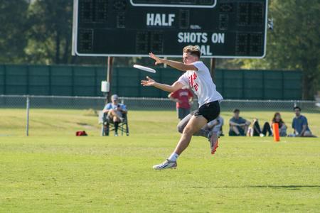 Jaxx member Noah Harms makes an athletic catch at the Union Jaxx ulitmate frisbee game during Family Weekend. - Photo by Abigail Aspinwall