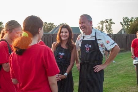 Dub and Suzie Oliver welcome new students to their home for ice cream during Welcome Week. - Photo by Lauren Steed