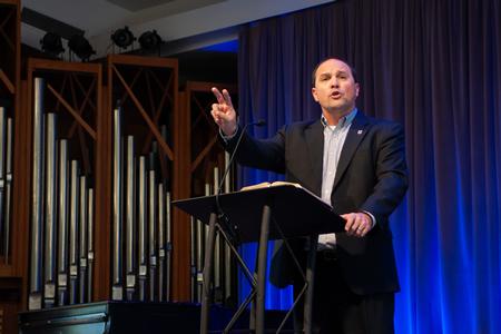 9/20/23 - Justin Wainscott, associate dean of the School of Theology and Missions, delivers a sermon during a chapel service. - Lauren Steed