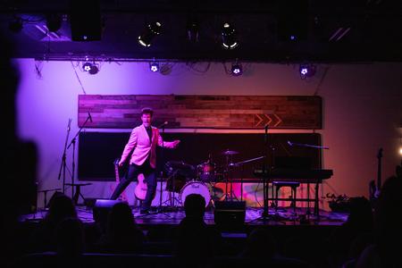 Caleb Coleman performs "Hound Dog" during an Open Mic Night in Barefoots. - Photo by Lindsey Atwood