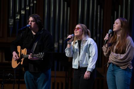 Members of the Chamber Worship Ensemble 2 (Isaac Schmidt, Lydia Brown, and Hanna Mercer) lead in worship during the fall Worship Choir Concert. - Photo by Kristi McMurry Woody