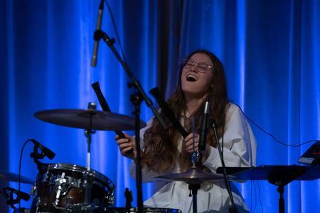 Elle Beauchaine plays the drums during the fall Worship Choir Concert. - Photo by Kristi McMurry Woody