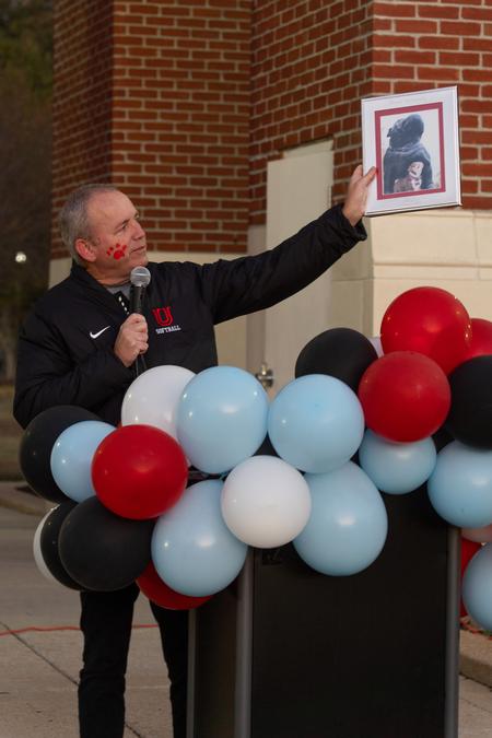 President Dub Oliver honors Buster (the second) at his retirement party during Homecoming 2023. - Photo by Lauren Steed