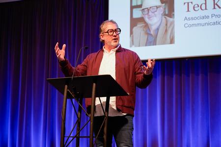 12/1/23 - Ted Kluck, associate professor of communication arts, speaks to students during the Faculty Member of the Year chapel service. - Lauren Steed