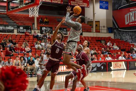 C.J. Jackson pulls up for a shot over a couple of Cumberland players