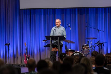 President Oliver speaks to incoming freshman and their families during Welcome Week's Blessings Chapel. - Photo by Karley Hathcock
