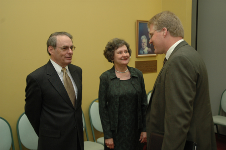 Dean of the School of Nursing Tim Smith (right) talks with nursing's Joyce Montgomery Henderson and her husband during Joyce's retirement reception. - Photo by Jim Veneman