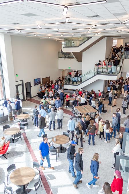 Students, alumni, donors, and guests check out the co-working commons in The HUB during The Ethos Forum dedication.