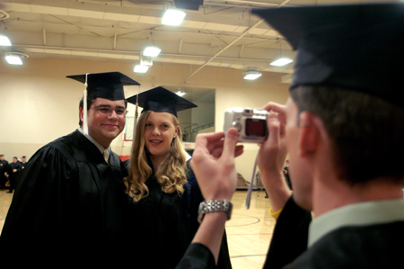 Broadcasting graduate Jonathan Yorkowitz and public relations graduate Jenny Eastman pose for a photo prior to the graduation ceremony. - Photo by Brad Moore