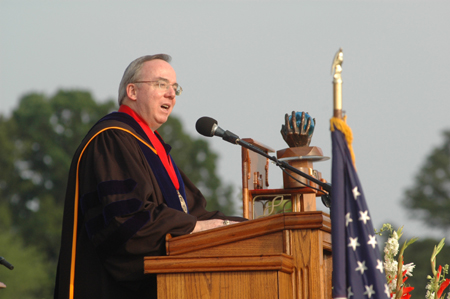 President David S. Dockery welcomes graduates and guests during the ceremony. - Photo by Jim Veneman
