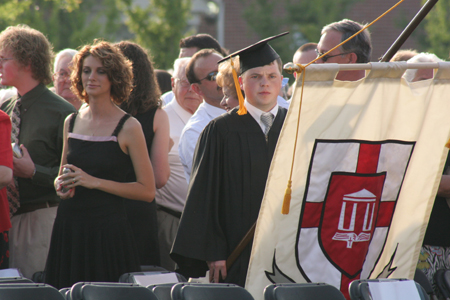 Senior Class President Brandon Nelms leads his class to their seats at spring graduation. - Photo by Kyle Kurlick