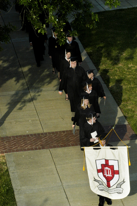Graduates file onto the Great Lawn at the beginning of the ceremony. - Photo by Kathleen Murray