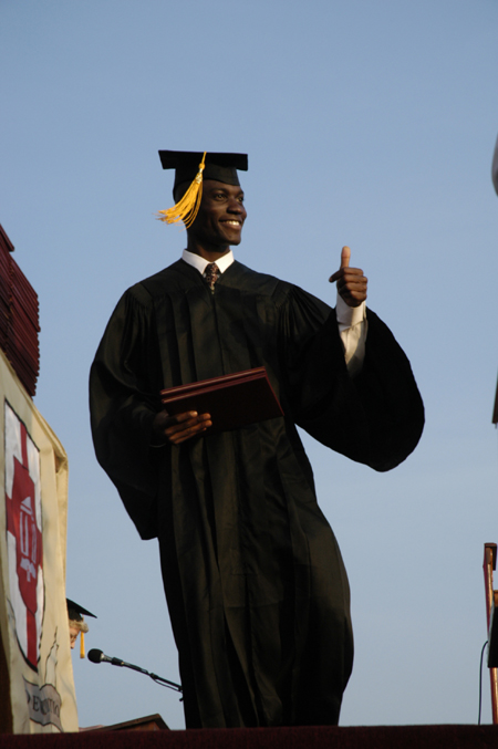Kolo Goshi, of Kpada, Nigeria, gives the thumbs up after receiving his engineering degree at spring graduation. - Photo by Kathleen Murray