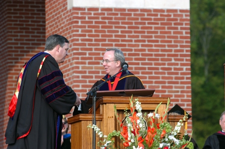 President Dockery inducts R. Albert Mohler Jr., president of Southern Baptist Theological Seminary in Louisville, Ky., as a fellow in Union's Carl F. H. Henry Center for Christian Leadership. - Photo by Morris Abernathy