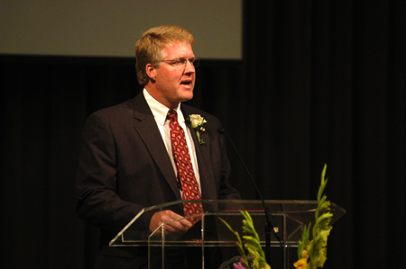 Dean of the School of Nursing Tim Smith encourages the nursing class of 2005 during nursing dedication service. - Photo by Morris Abernathy