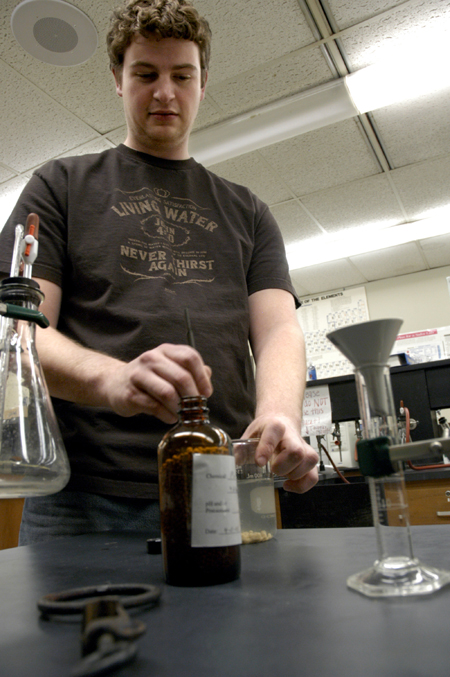 Senior Brent Jones, biology and chemistry major, prepared his research on monomer reactions for the Union University Scholarship Symposium. - Photo by Kathleen Murray