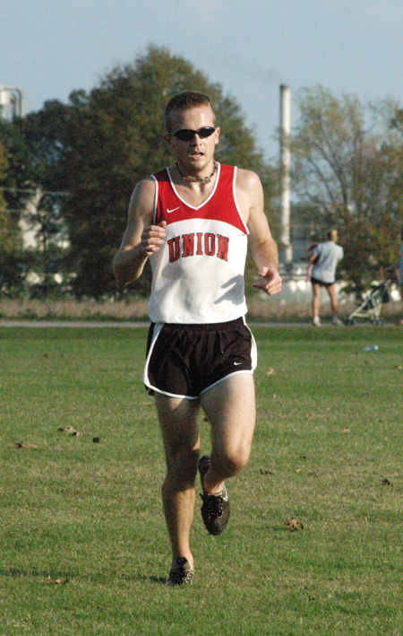Senior runner Chris Winter approaches the finish line in the 2004 TranSouth Cross Country Meet.  Winter took second place in the event. - Photo by Steven Aldridge