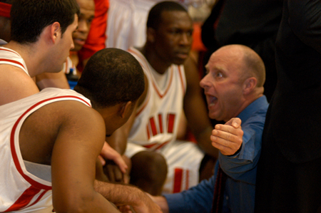 Head Coach Ralph Turner talks with his team during a timeout in Union win in the TranSouth Tournament Championship game. - Photo by Jonathan Blair