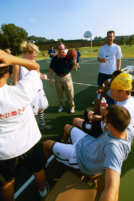 Halftime rest for the Faculty/Staff team during the Faculty/Staff vs. Student game at the dedication of the Class of 2002 Basketball Court. - Photo by Justin Veneman