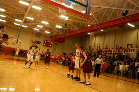 Corey Burkett (45) attempts a free throw in front of a full house duing Union win over Lyon College in the TranSouth Tournament Championship game. - Photo by Jonathan Blair
