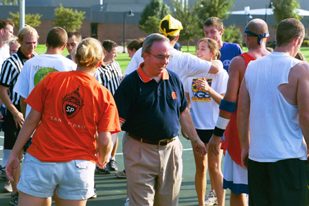 President David S. Dockery congratulates the participants of the Faculty/Staff vs. Student game at the dedication of the Class of 2002 Basketball Court. The Faculty/Staff team by a narrow margin of 32-29. - Photo by Justin Veneman