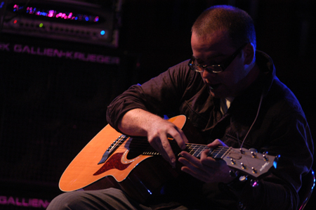 Alum Jason Hamlin, guitarist for Scratch Track, performs a solo during the Spring Thing 2005 concert. - Photo by Kristen Nicole Sayres