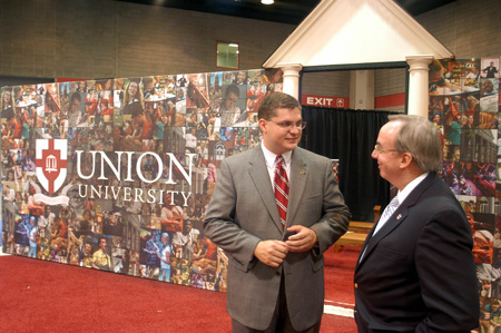 Union University President David S. Dockery talks with a visitor at the Union booth during the Southern Baptist Convention. - Photo by Brad Moore
