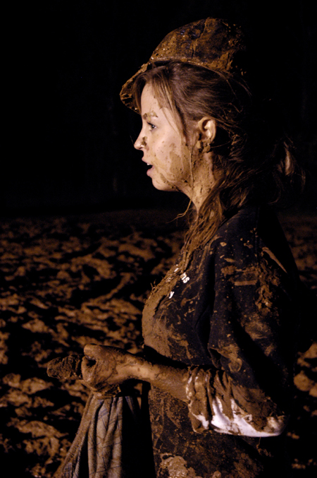 Junior Amanda Raley looks a little stunned after her experience at the Young Alums' Midnight Mudness. - Photo by Kathleen Murray