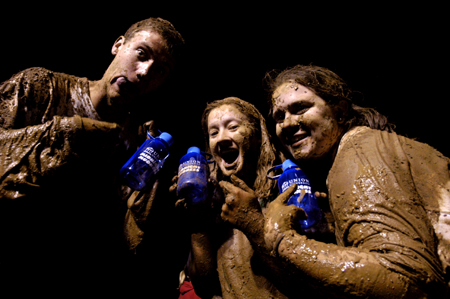 Juniors Chris Arnold, Kathleen Lokey and Karyn Caldwell proudly display their Midnight Mudness water bottles. - Photo by Kathleen Murray