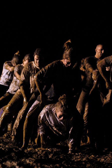 Juniors play leap frog during the Young Alums' annual Midnight Mudness event. - Photo by Kristen Nicole Sayres